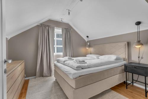 Ένα ή περισσότερα κρεβάτια σε δωμάτιο στο City Center Gem in Tromsø