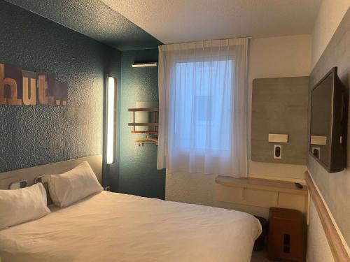 Postel nebo postele na pokoji v ubytování ibis Budget Le Treport Mers Les Bains