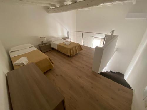 Кровать или кровати в номере Prince Suite Palermo