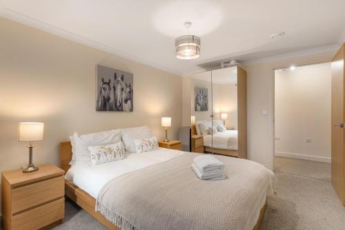 Voodi või voodid majutusasutuse Bookbinders Apartments Leeds City Centre toas