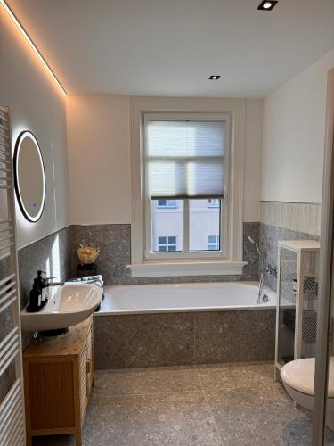 Un baño de Carl von Rosé