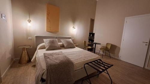 a bedroom with a large bed in a room at Ta-49 bed e breakfast in Naples