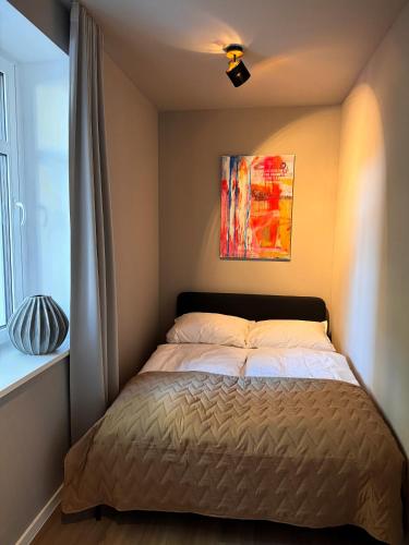 Una cama o camas en una habitación de Carl von Aurora