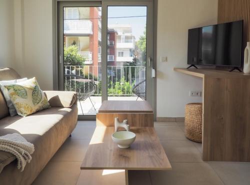 TV a/nebo společenská místnost v ubytování Trinity Urban Residences Plumeria