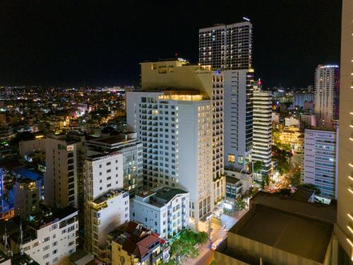 an aerial view of a city at night at Gonsala Hotel Nha Trang in Nha Trang
