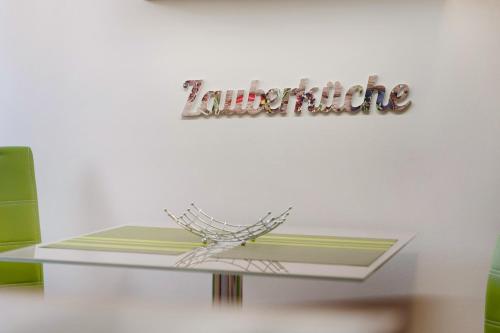 a shelf with a sign on a wall with a baseball at Ferienwohnung Bleichen in Stralsund