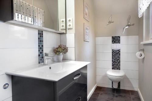 Koupelna v ubytování Ferienwohnung Bleichen