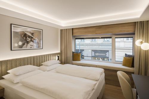 Postel nebo postele na pokoji v ubytování Hotel Schwarzer Bär