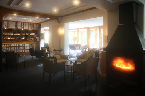 Posezení v ubytování Hôtel Restaurant La Buffe