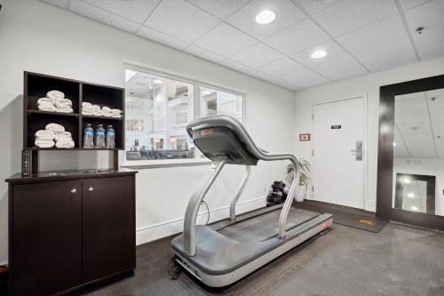 a fitness room with a treadmill and a window at Sonesta Essential Vacaville Napa Valley in Vacaville