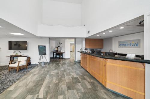 an office lobby with a reception counter and a desk at Sonesta Essential Vacaville Napa Valley in Vacaville
