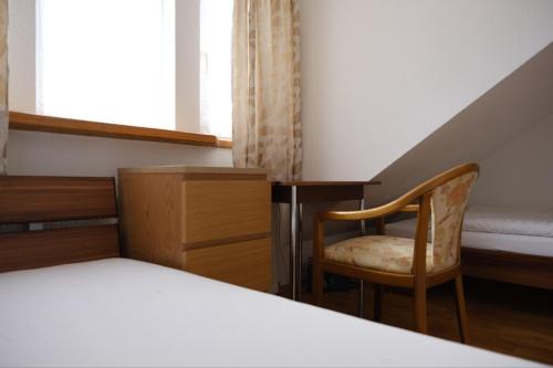 Letto o letti in una camera di Euromamhaus - Korean B&B