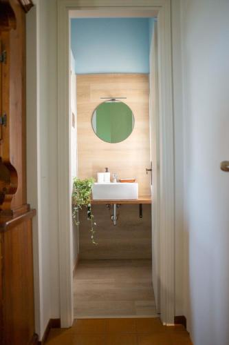 a bathroom with a sink and a mirror at La casa di Trude in Padenghe sul Garda