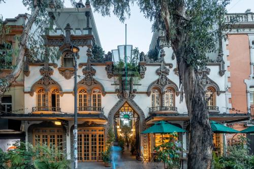 an old building with a lot of windows at Hotel Parián in Mexico City