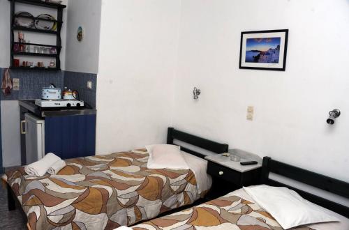 Postel nebo postele na pokoji v ubytování Rooms Mike Paros