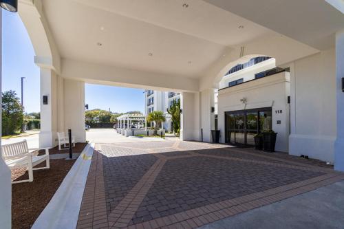 an empty lobby of a building with a glass door at Hotel Alice in Atlantic Beach