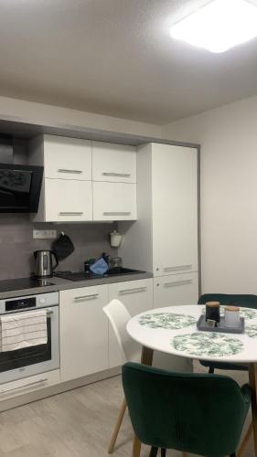 CHRIS Apartmentにあるキッチンまたは簡易キッチン