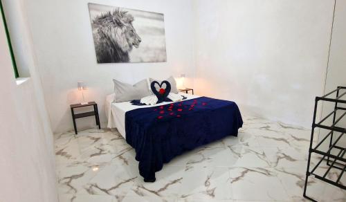 Ένα ή περισσότερα κρεβάτια σε δωμάτιο στο Casa Cristal