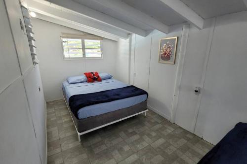 Una cama o camas en una habitación de Container 1 with pool, free wifi fully equiped