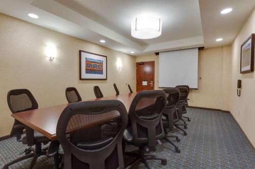 a conference room with a long table and chairs at Drury Inn & Suites Gainesville in Gainesville