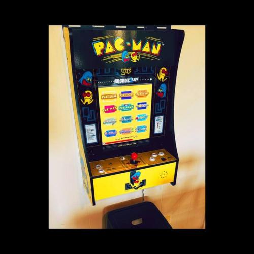 a pinball machine with a pas war game on it at 1MMView-2Kings-HotTub-PoolTable-Arcade-Waterfall in Seven Devils