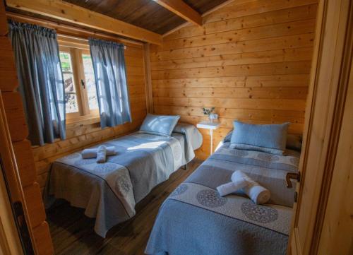 Postel nebo postele na pokoji v ubytování Cabaña 82 by Villamya