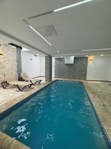 Bazén v ubytování Apartment in Santo Domingo este nebo v jeho okolí