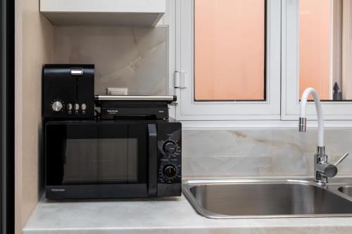A kitchen or kitchenette at Casa Centrale ad Argostoli!