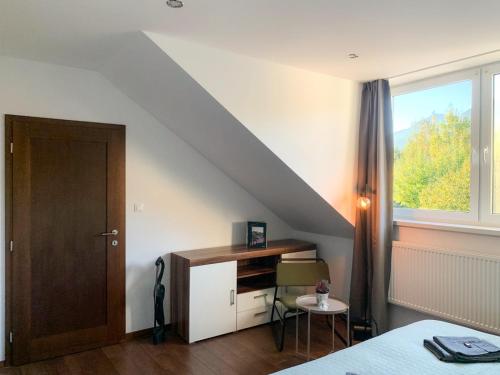 Postel nebo postele na pokoji v ubytování Apartman pod Tatrami, High Tatras