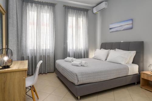 A bed or beds in a room at Casa Centrale ad Argostoli!