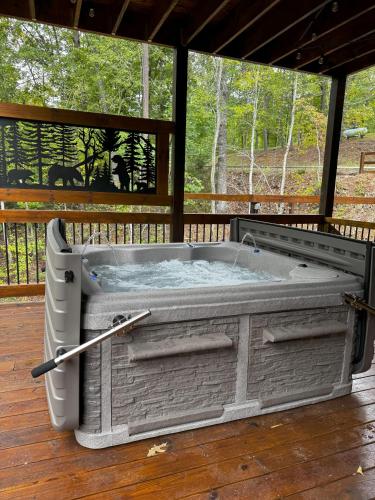 Luxe Cabin with Game Room, Hot Tub & Firepit photo 15