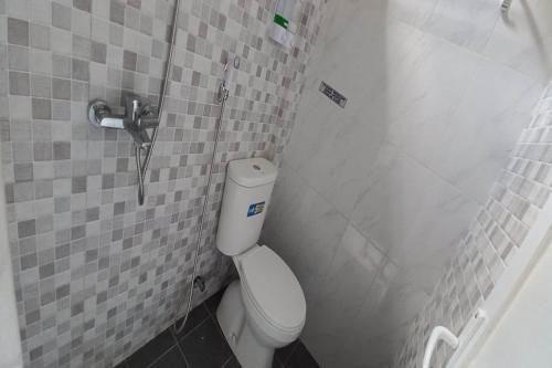 Koupelna v ubytování Hotel O Setia Budi Guest House 2