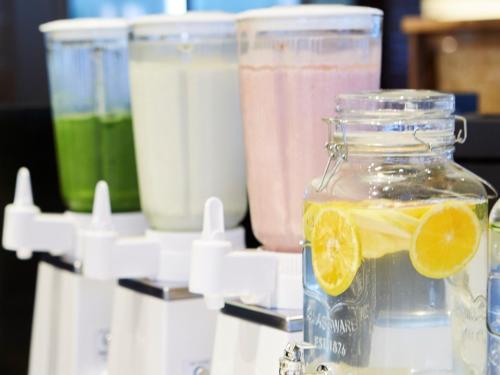 a glass jar filled with liquid with a lemon slice in it at Blanchette Nankishirahama - Vacation STAY 05732v in Kanayama