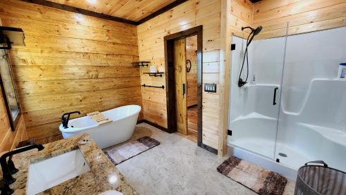 Luxe Cabin with Game Room, Hot Tub & Firepit photo 14