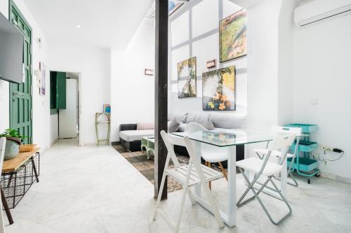 Posezení v ubytování Penthouse con terraza- 2D 2B- Triana