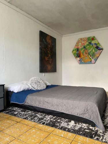 Postel nebo postele na pokoji v ubytování Hostal Centeno