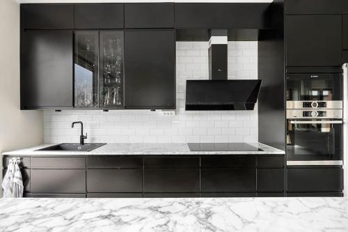 Η κουζίνα ή μικρή κουζίνα στο Lyxig villa med herrgårdsutsikt