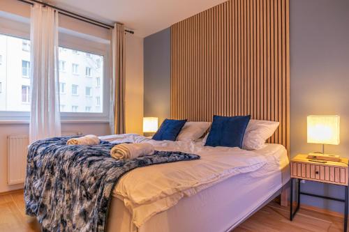 Кровать или кровати в номере Superb Fully Equipped Apartment, 9 min to City Center via Metro