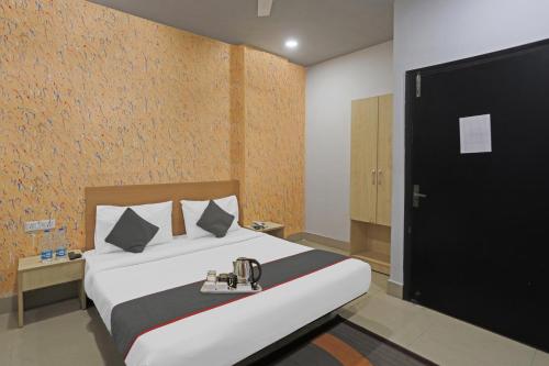Postel nebo postele na pokoji v ubytování Super Townhouse Grand Pacific Ocean