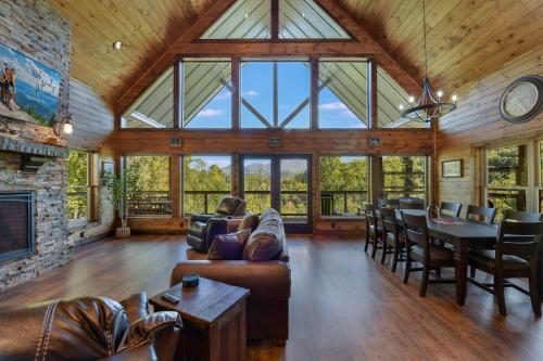 a large living room with a large glass ceiling at New Luxury Lodge - Gatlinburg - Mountain View! in Gatlinburg