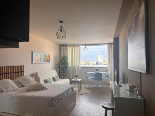 Emplacement idéal, plage, parking, internet !