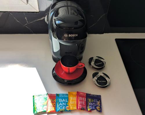 a coffee maker sitting on top of a counter at Appart moderne proche plage avec terrasse et climatisation in Hyères