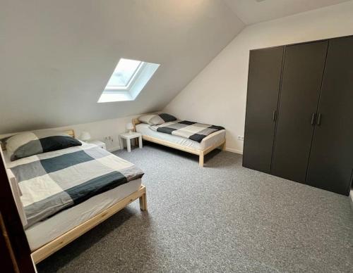 Postel nebo postele na pokoji v ubytování Ferien- Monteurwohnung 301 Diwo Dillingen