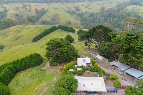 an aerial view of a house on a hill at Alyeska farm house in Apollo Bay