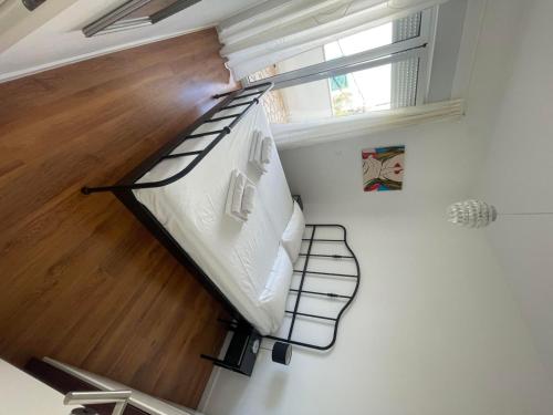 a bedroom with a bunk bed in a room at Apartments Leonardo in Primošten