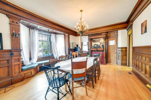 a dining room with a table and chairs at Spacious Pittsburgh Rental Walk to Frick Park! in Pittsburgh