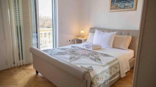 Ένα ή περισσότερα κρεβάτια σε δωμάτιο στο House Isabell