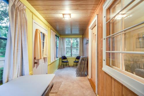 a hallway of a tiny house with a window at Mtn Bikers Cottage Bike to Cuyuna Lakes Trails in Crosby