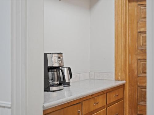 a kitchen with a counter top with a coffee maker at Oakland, Pittsburgh !F Unique and Stylish Private Bedroom with Private Bathroom in Pittsburgh