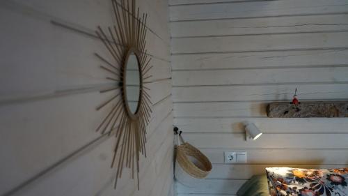 a mirror on the wall of a room at La Casita in Cuartillos